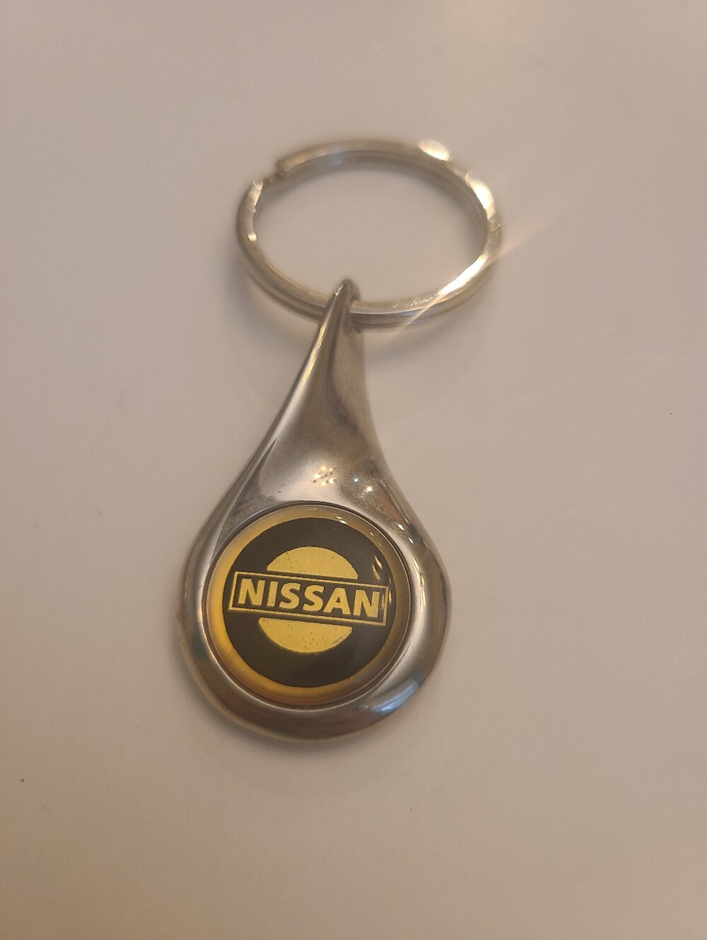 Vintage Nissan Keychain, Pre-owned, some minor wear